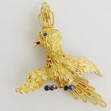 Gold and Sapphire Bird Brooch